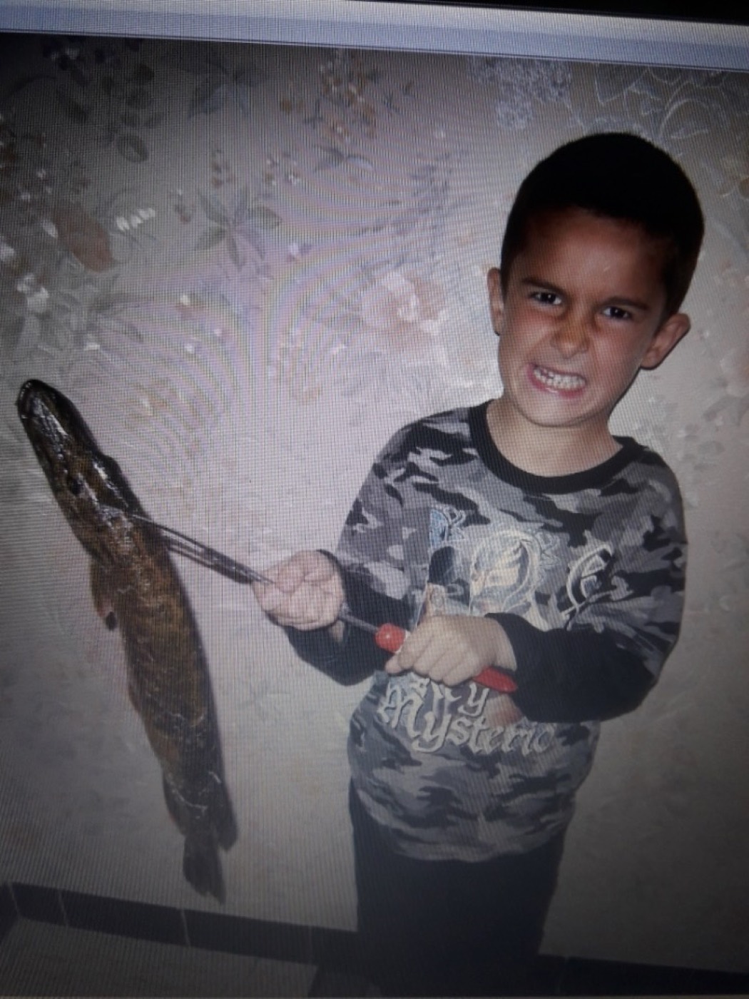 Vincent de niño con otro lucio y una cara muy orgullosa